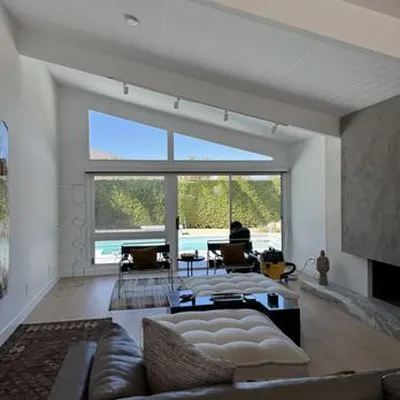 Floor-to-ceiling glass cleaning at new construction